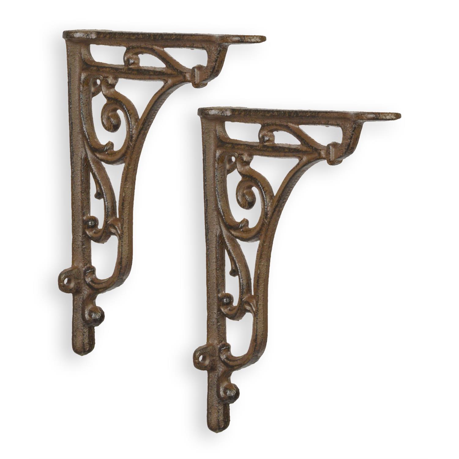 A PAIR OF CAST IRON WALL BRACKETS