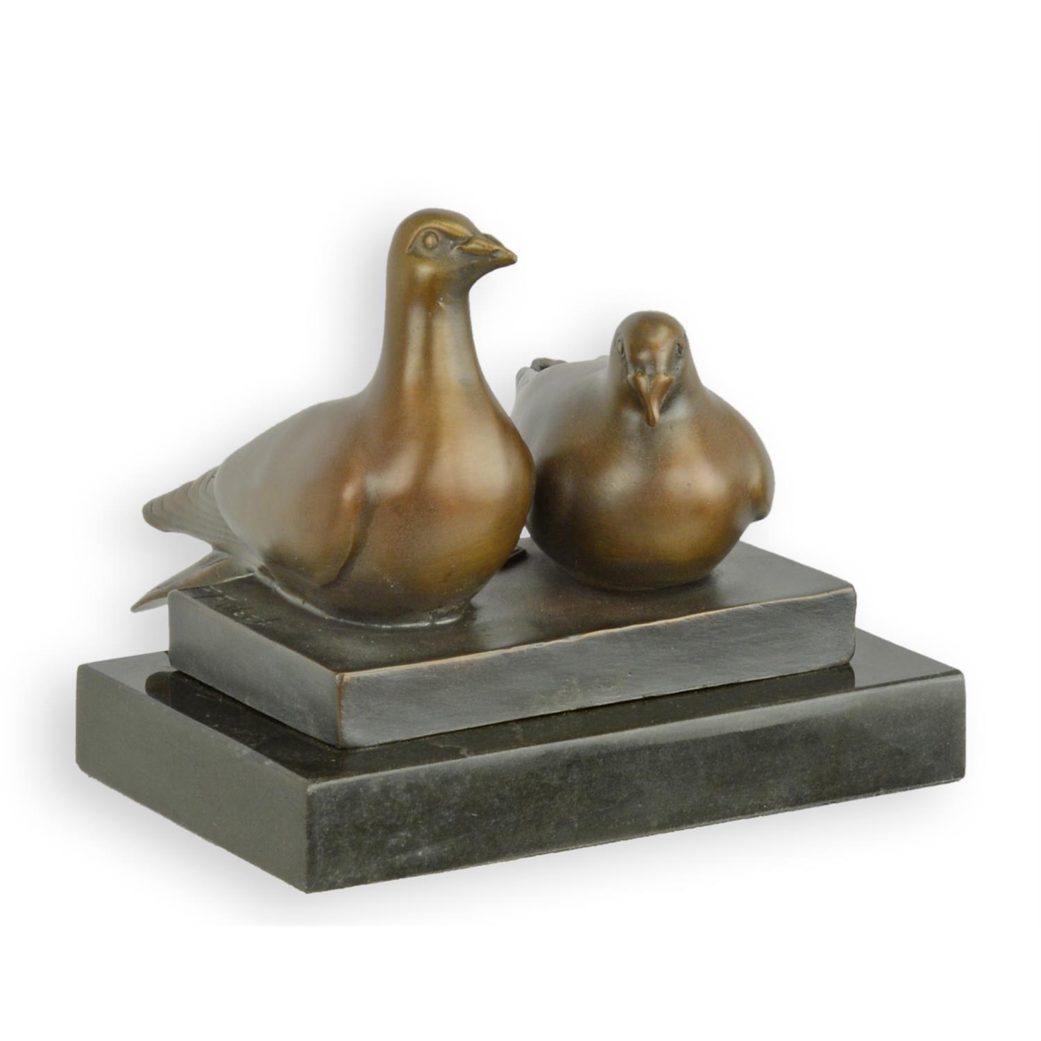 A BRONZE SCULPTURE OF A PAIR OF PIGEONS